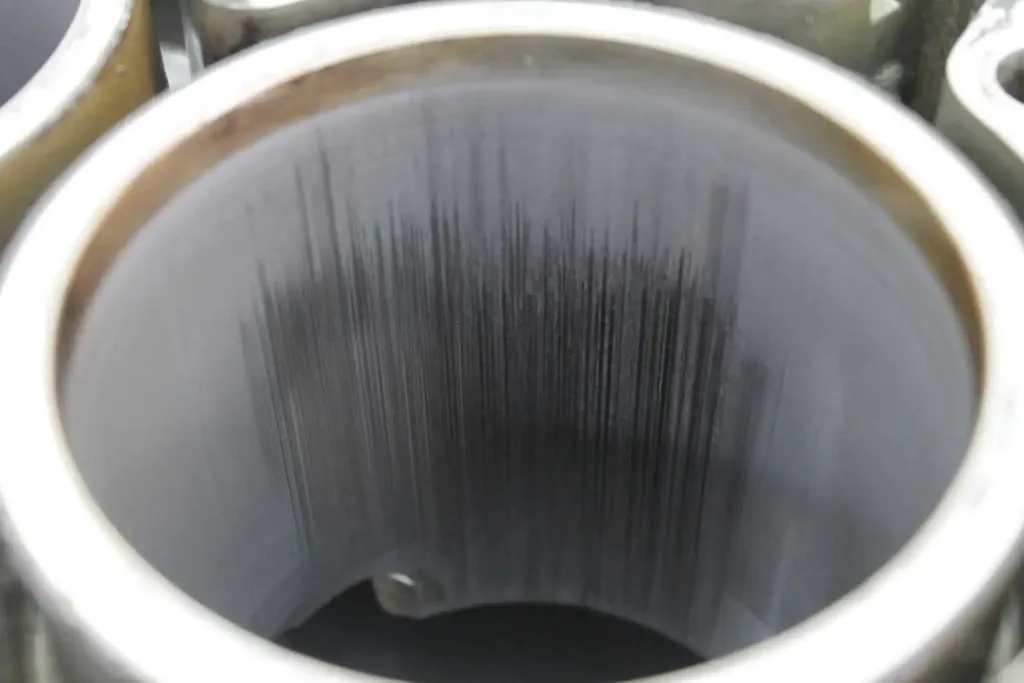 Porsche cylinder bore scoping for cylinder bore scoring